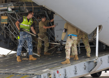 Royal Australian Air Force Leading Aircraftman Carl Dransfield from No. 27 Squadron assists United States Air Force (USAF) personnel unload a flightline generator from a USAF C-17A Globemaster III during Exercise Cope North 24, Andersen Air Force Base, Guam, USA. *** Local Caption *** Exercise Cope North 24 is a multilateral field training exercise involving the United States Air Force (USAF), Japan Air Self-Defense Force (Koku-Jieitai), and the Royal Australian Air Force (RAAF), conducted from Andersen Air Force Base, Guam, from 5 to 23 February 2024.
 
The exercise is focused on enhancing Australia, the United States, and Japans integration, deepening our relationships, and strengthening engagement to ensure the capability to deliver air power and agile operations in the Indo-Pacific region.
 
The RAAF has deployed a C-27J Spartan and a contingency response squadron, as well as support and operations personnel. RAAF aviators will also be integrated within a Multinational Task Force Headquarters.